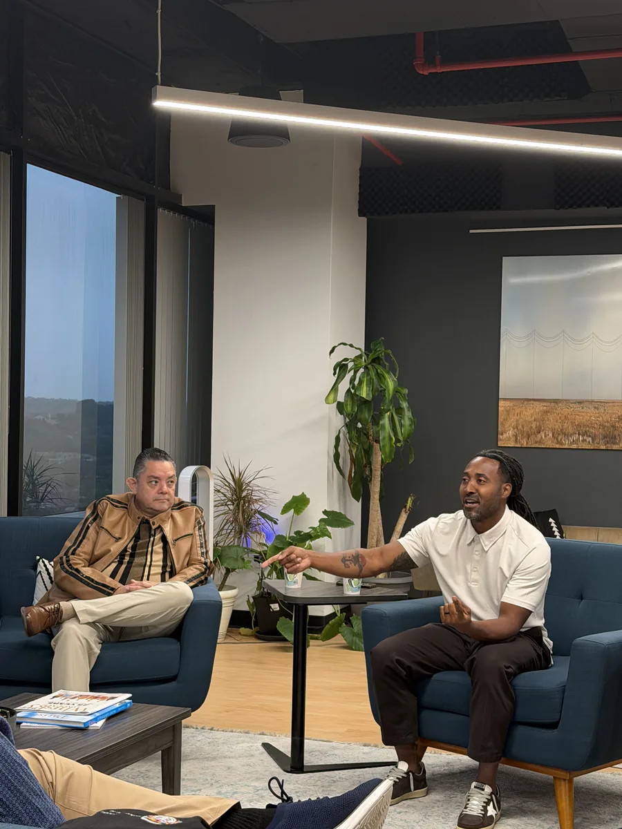 Two Growth Quarter members in conversation during a session